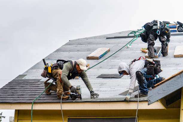 Professional Gutter Installation technician working in Somerset, TX